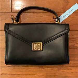 Antonio Melani black leather turn lock flap purse